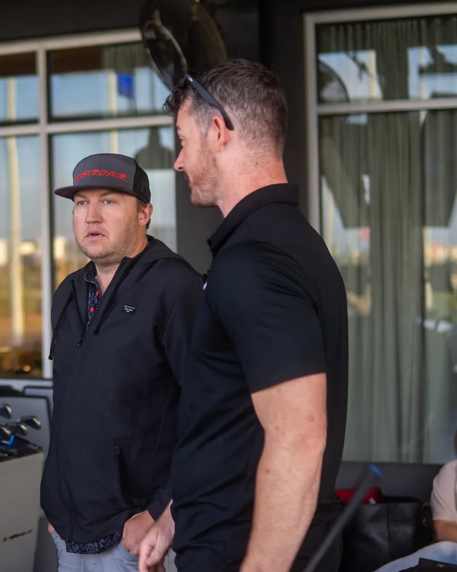 Douglas and a contractor planning their marketing together