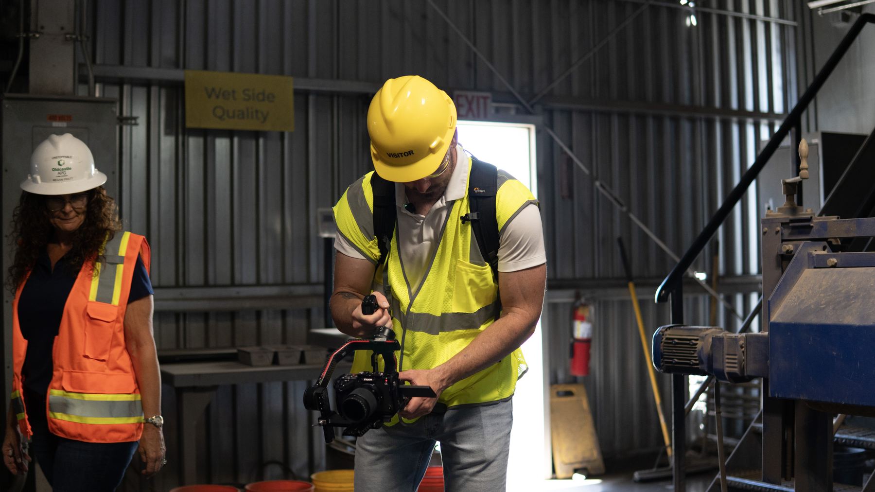 Douglas filming a contractor on a real job site