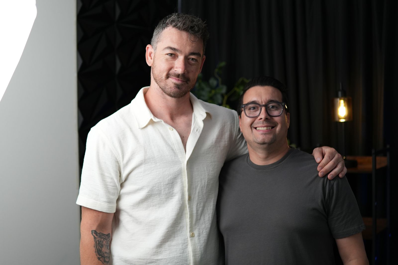 Douglas Laird smiling with a contractor client