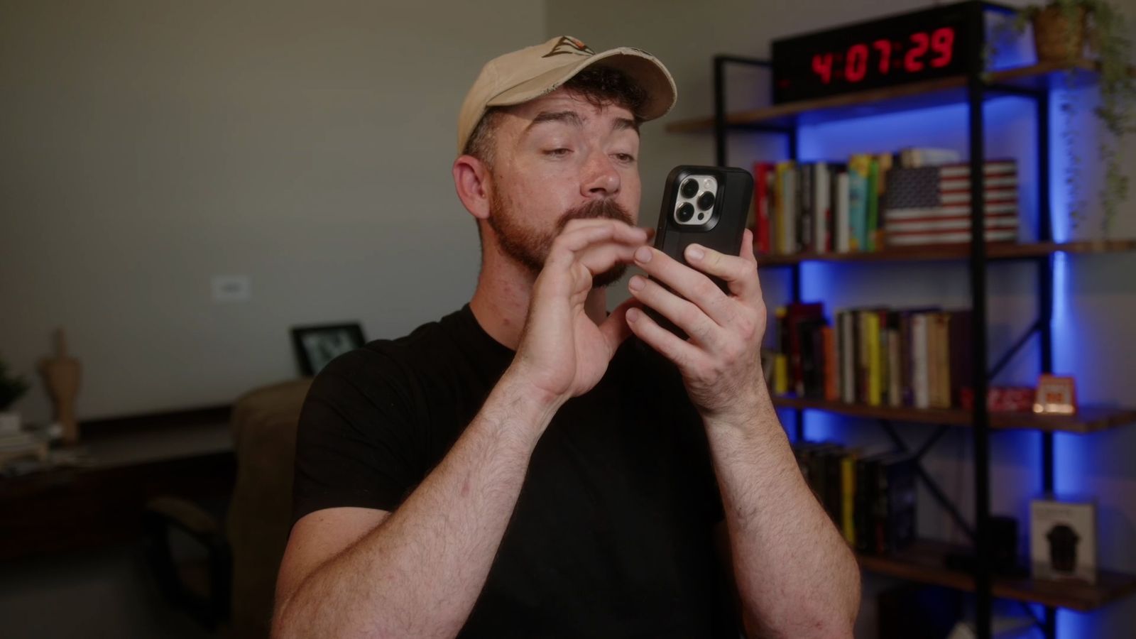 Douglas Laird checking a Trust Score report on his phone
